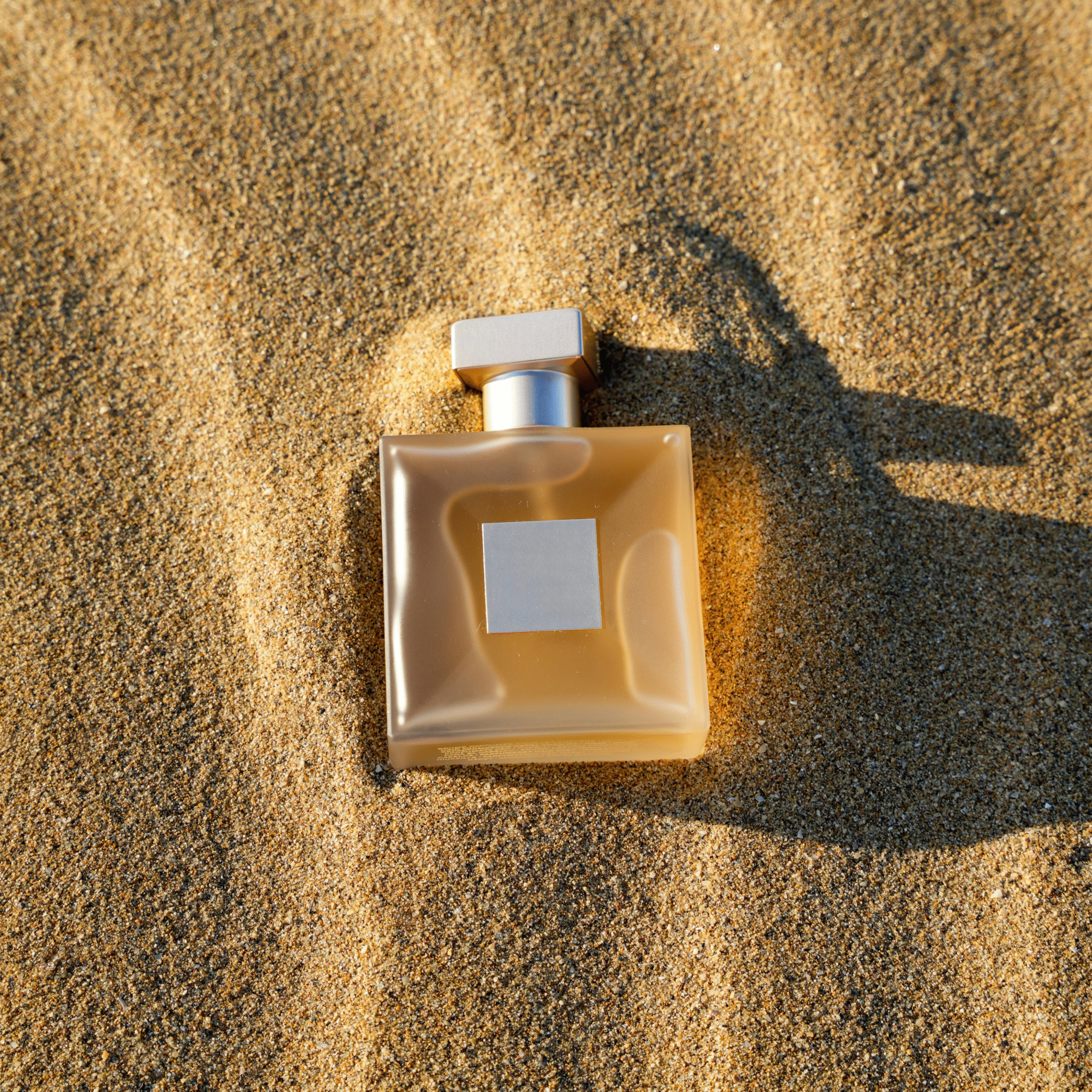 perfume in sand